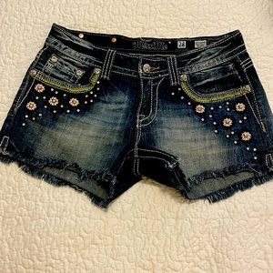 Womens Miss Me Denim shorts size 28 with rhinestones.